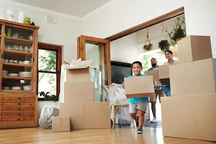 Are You Ready to Build Your Own Home? 3 Things You Should Sort Out First Siege family moving into new home